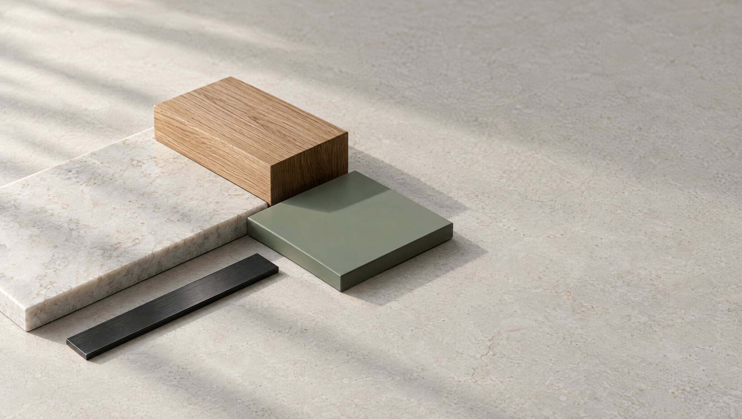 Material samples for a kitchen laid out on a workbench
